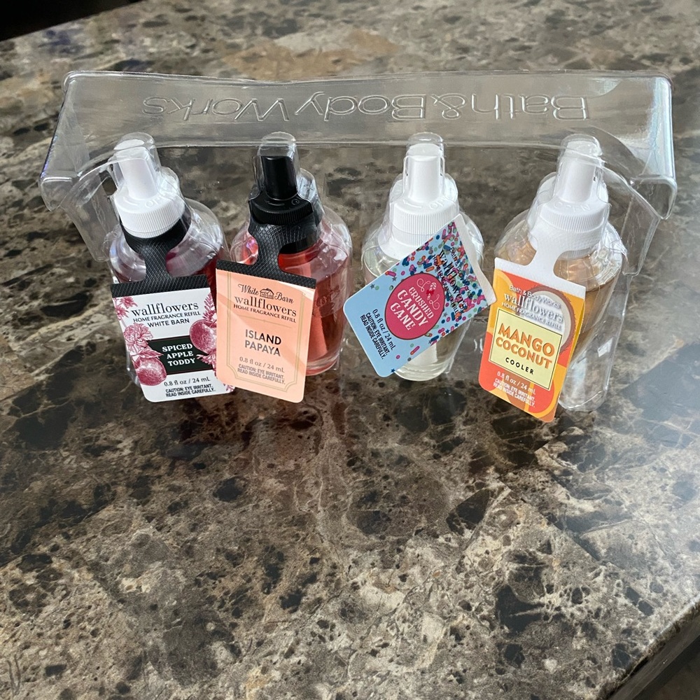 Four brand new Bath & Body Works wallflowers
